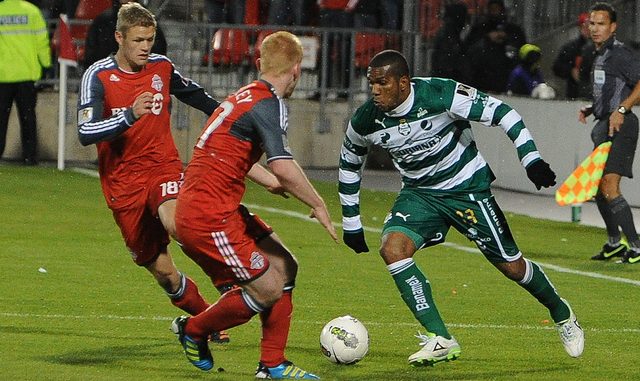Santos Laguna forward Christian Suarez attempts to move the ball in between Toronto FC defender Richard Eckersley and midfielder Nick Soolsma. Both teams played to a draw in front of 18,950 fans at BMO Field in Toronto (Karan Vyas) Santos Laguna forward Christian Suarez attempts to move the ball in between Toronto FC defender Richard Eckersley and midfielder Nick Soolsma. Both teams played to a draw in front of 18,950 fans at BMO Field in Toronto (Karan Vyas)
