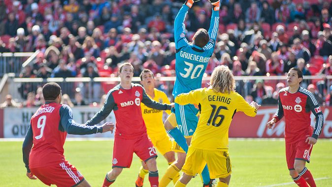 Columbus Crew goalkeeper Andy Gruenebaum leaps up to grab a ball in the air on Saturday afternoon at BMO Field. The Crew capitalized on a Toronto FC mistake in the second half and hung on for a 1-0 win (John Lucero) Columbus Crew goalkeeper Andy Gruenebaum leaps up to grab a ball in the air on Saturday afternoon at BMO Field. The Crew capitalized on a Toronto FC mistake in the second half and hung on for a 1-0 win (John Lucero)