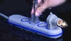 StickTweezersInWetSurgeProtector StickTweezersInWetSurgeProtector