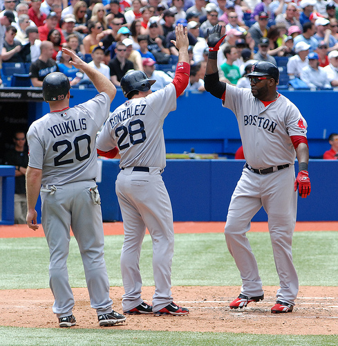 Kevin Youkilis (left) and Adrian Gonzalez (centre) congratulate David Ortiz (right) on his homerun for the Red Sox in the 5th inning Kevin Youkilis (left) and Adrian Gonzalez (centre) congratulate David Ortiz (right) on his homerun for the Red Sox in the 5th inning