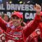 Dario Franchitti raises his arms in celebration after winning Honda Indy Toronto
