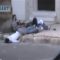 Amateur video released by the Shams News Network shows dead and injured bodies on the street in Homs on August 10.