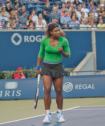 Serena Williams pumps her fist in celebration after winning a point in her semifinal match Saturday (John Lucero)