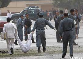 Afghan Policemen_carrying_the_body_of_a_suicide_attacker_in_Kabul_2 Afghan Policemen_carrying_the_body_of_a_suicide_attacker_in_Kabul_2