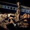Security officer_stands_guard_next_to_a_derailed_passenger_train
