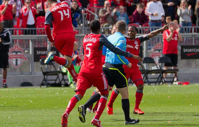 TFC striker Danny Koevermans (left) jumps up and does a fist pump in celebration of his first of two goals in the match (JP Dhanoa)