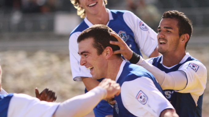 FC Edmonton defender John Jonke (centre) celebrates his goal with his teammates on Sunday
