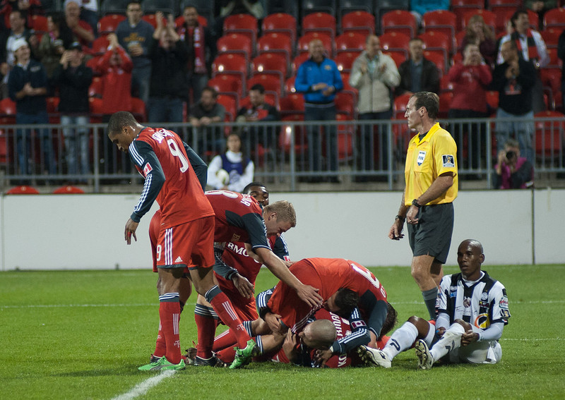 Toronto FC players jump on striker Danny Koevermans in celebration of his goal in the first half (John Lucero) Toronto FC players jump on striker Danny Koevermans in celebration of his goal in the first half (John Lucero)