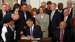 story.obama.signs.health.law.gi