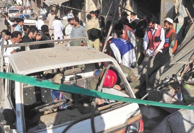 The site of a bomb blast in Peshawar The site of a bomb blast in Peshawar