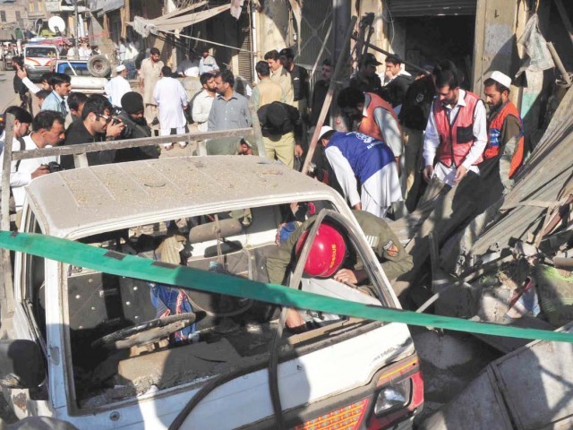 The site of a bomb blast in Peshawar The site of a bomb blast in Peshawar
