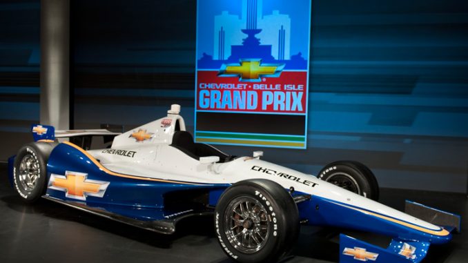 The all new 2012 Chevrolet IndyCar. New Detroit Grand Prix logo in background.