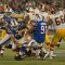 Washington Redskins quarterback John Beck is sacked by Buffalo Bills linebacker Danny Batten and defensive end Spencer Johnson at Rogers Centre Sunday (John Lucero)