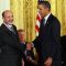 B. Jayant Balinga receiving medal award from President Obama