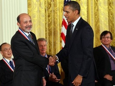 B. Jayant Balinga receiving medal award from President Obama B. Jayant Balinga receiving medal award from President Obama