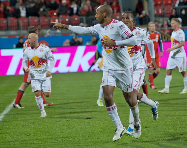 New York Red Bulls striker Thierry Henry celebrates his late game-tying goal Saturday night at BMO Field (John Lucero) New York Red Bulls striker Thierry Henry celebrates his late game-tying goal Saturday night at BMO Field (John Lucero)