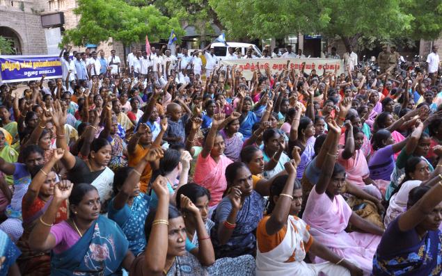 Women staging a demonstration in front of the collectorate in Madurai Women staging a demonstration in front of the collectorate in Madurai