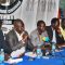 The chairperson of the convention organising committee Angok Akuien (holding microphone) briefs the press in Juba.[©Gurtong]