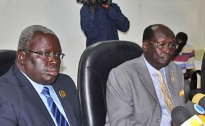 South Sudanese Deputy Finance Minister Marial Awou (left) flanked by Information Minister Dr Barnaba Marial at the revenue management workshop in Juba. [©Gurtong]
