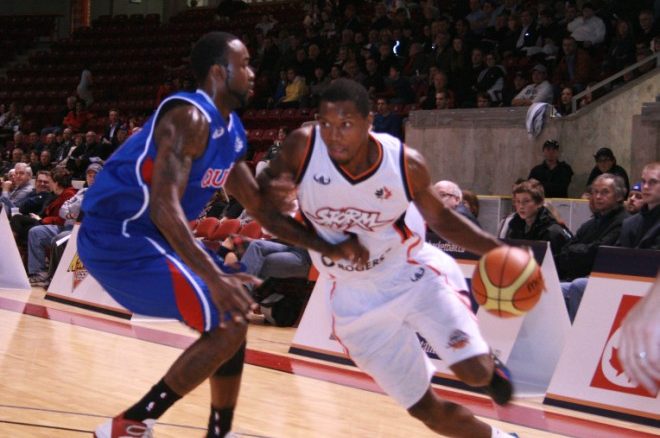 Summerside Storm small forward Louie McCroskey drives past a Quebec Kebs guard on Thursday night in the team's upset 120-105 win