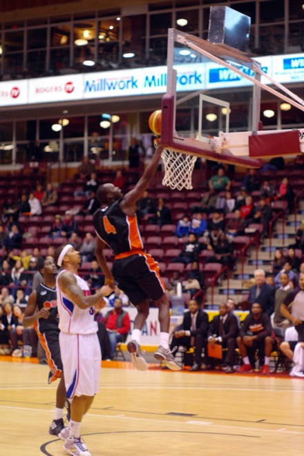 Oshawa Power point guard Tut Ruach goes up for an uncontested layup for two of his game-high 23 points Wednesday night at GM Centre. Oshawa Power point guard Tut Ruach goes up for an uncontested layup for two of his game-high 23 points Wednesday night at GM Centre.