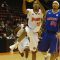 Oshawa Power guard drives to the net as Quebec Kebs forward James "Boo" Jackson looks on