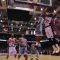 Oshawa Power small forward Akeem Wright muscles past a pair of Moncton Miracles for a dunk on Thursday night at the General Motors Centre