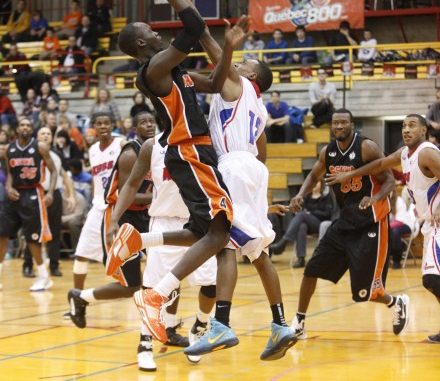 Durham's Team the Oshawa Power Fall to the Quebec Kebs 96-82 Oshawa Power point guard Tut Ruach pulls up for a jumper during a loss to the Quebec Kebs at Laval University on Friday night.