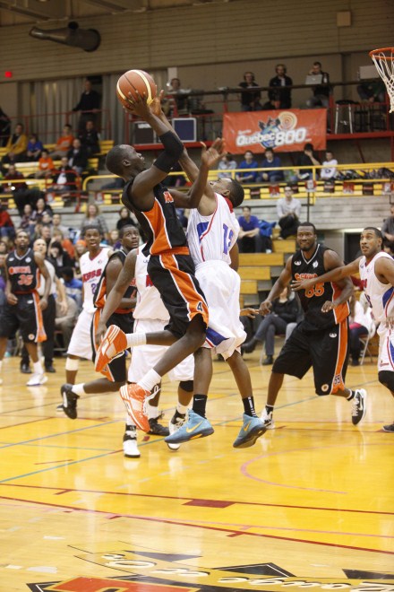 Oshawa Power point guard Tut Ruach pulls up for a jumper during a loss to the Quebec Kebs at Laval University on Friday night. Oshawa Power point guard Tut Ruach pulls up for a jumper during a loss to the Quebec Kebs at Laval University on Friday night.