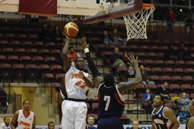 Oshawa Power forward Omari Johnson puts up a hook shot during a closely contested game against the Summerside Storm on Thursday night at the GM Centre in Oshawa.