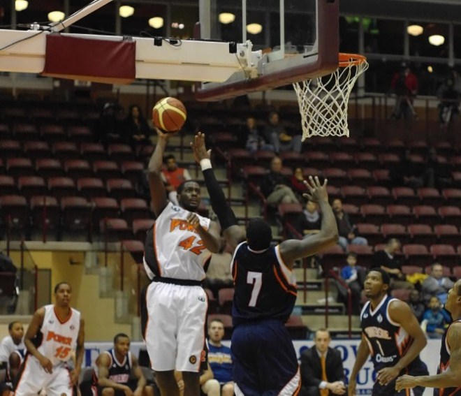 Oshawa Power forward Omari Johnson puts up a hook shot during a closely contested game against the Summerside Storm on Thursday night at the GM Centre in Oshawa. Oshawa Power forward Omari Johnson puts up a hook shot during a closely contested game against the Summerside Storm on Thursday night at the GM Centre in Oshawa.