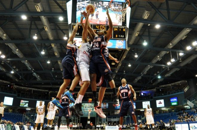 Summerside Storm guard Julian Allen (24) attempts to block a drive from the Saint John Millrats