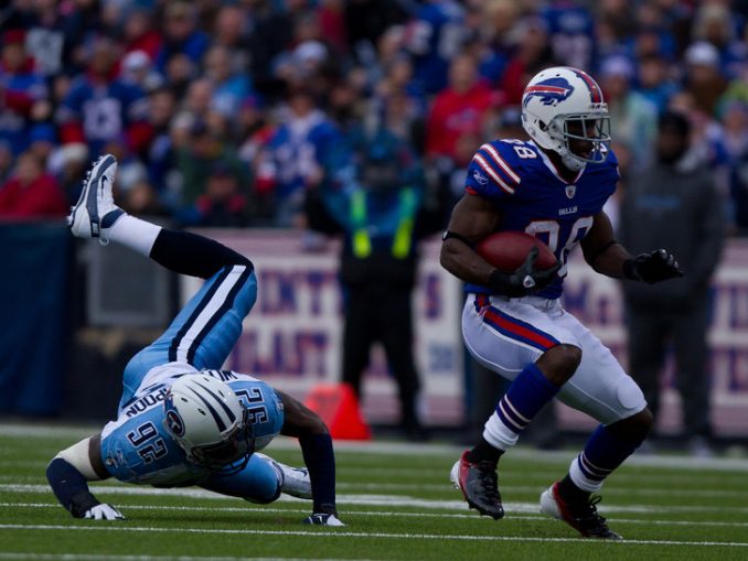 Titans linebacker Will Weatherspoon falls to the ground after failing to tackle Spiller (JP Dhanoa)