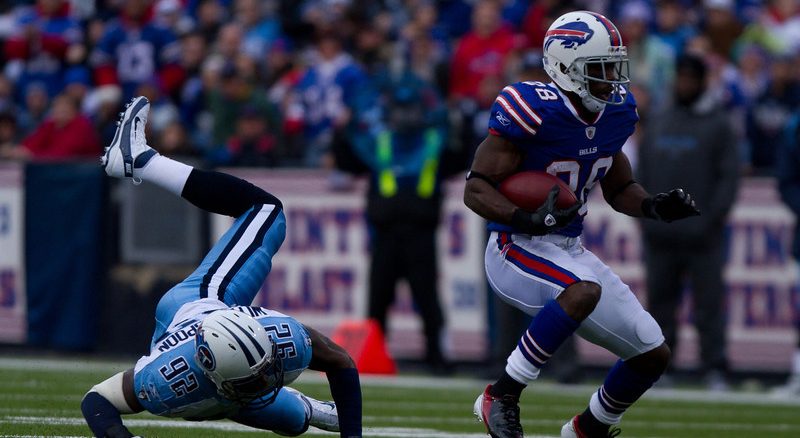 Titans linebacker Will Weatherspoon falls to the ground after failing to tackle Spiller (JP Dhanoa)