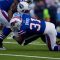 Buffalo Bills free safety Jarius Byrd tackles Tennessee Titans running back Chris Johnson at Ralph Wilson Stadium on Sunday afternoon (JP Dhanoa)