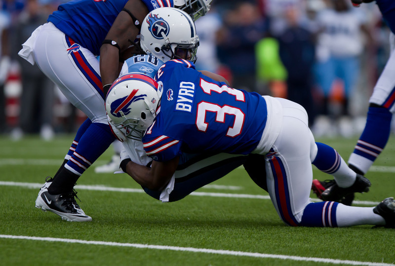 Buffalo Bills free safety Jarius Byrd tackles Tennessee Titans running back Chris Johnson at Ralph Wilson Stadium on Sunday afternoon (JP Dhanoa) Buffalo Bills free safety Jarius Byrd tackles Tennessee Titans running back Chris Johnson at Ralph Wilson Stadium on Sunday afternoon (JP Dhanoa)