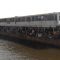 Returnees on board of the barge from Khartoum waiting to be received in Juba [©Gurtong]