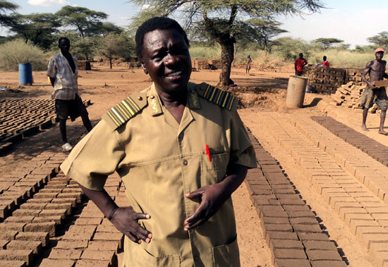 Mr. David Eriga Enodius speaking to Gurtong at the brick construction site in Riwoto [©Gurtong]