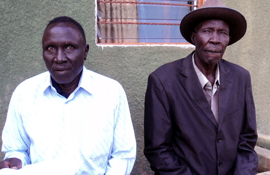 The Peace Committee chairperson, Mr. Paul Langa (left) and a Committee member, Mr. Felix Oking [©Gurtong]