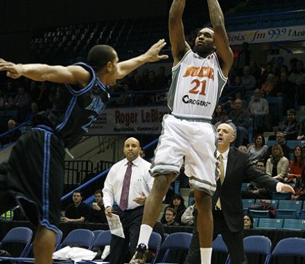 Moncton Miracles small forward Akeem Wright puts a jump shot over Halifax Rainmen shooting guard Lawrence Wright on Monday night at Moncton Coliseum. The Miracles won 102-91.