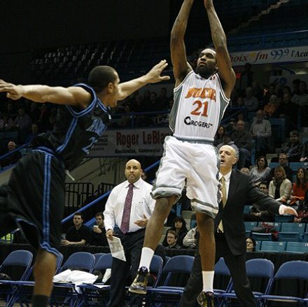 Moncton Miracles small forward Akeem Wright puts a jump shot over Halifax Rainmen shooting guard Lawrence Wright on Monday night at Moncton Coliseum. The Miracles won 102-91.