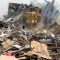 A bulldozer demolishing parts of Konyokonyo market to pave way for new constructions [©Gurtong]