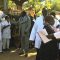 Dr Michael Milly Hussein and Dr Yatta Lugor shaking hands with the doctors and nurses during a past event