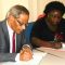 (L-R) The Consul General of India, Parimal Kar and Hon. Beatrice Khamisa Wani signing the MoU in Juba [©Gurtong]