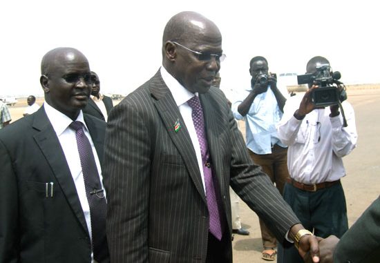 Governor Simon Kun Puoch (shaking hands) arrives at the Juba International Airport [©Gurtong]