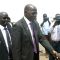 Governor Simon Kun Puoch (shaking hands) arrives at the Juba International Airport [©Gurtong]