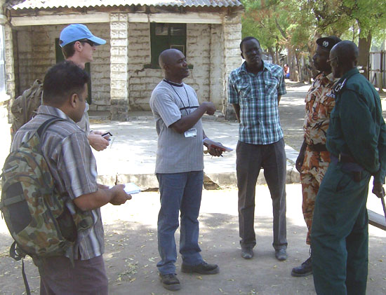 Bor Police Inspector (2nd - right) briefing the UNMISS officials after identifying the corpse [©Gurtong]