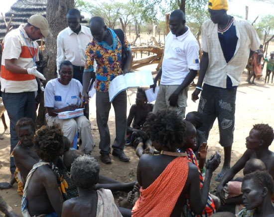 WHO and MoH officials at Kerenge village of Kimotong, Budi County investigating recent cases of measles following reports [©Gurtong]