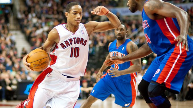 Raptors guard DeMar DeRozan attempts to drive past Detroit Pistons forward Jason Maxiell. DeRozan scored a team-high 23 points and attacked the basket often in his team's 103-93 win at the Air Canada Centre on Wednesday night (John Lucero)