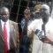 (L-R) Juba Deputy Mayor and Mayor (speaking) at Konyokonyo market as traders count their losses in rubble after a fire accident on Thursday [©Gurtong]